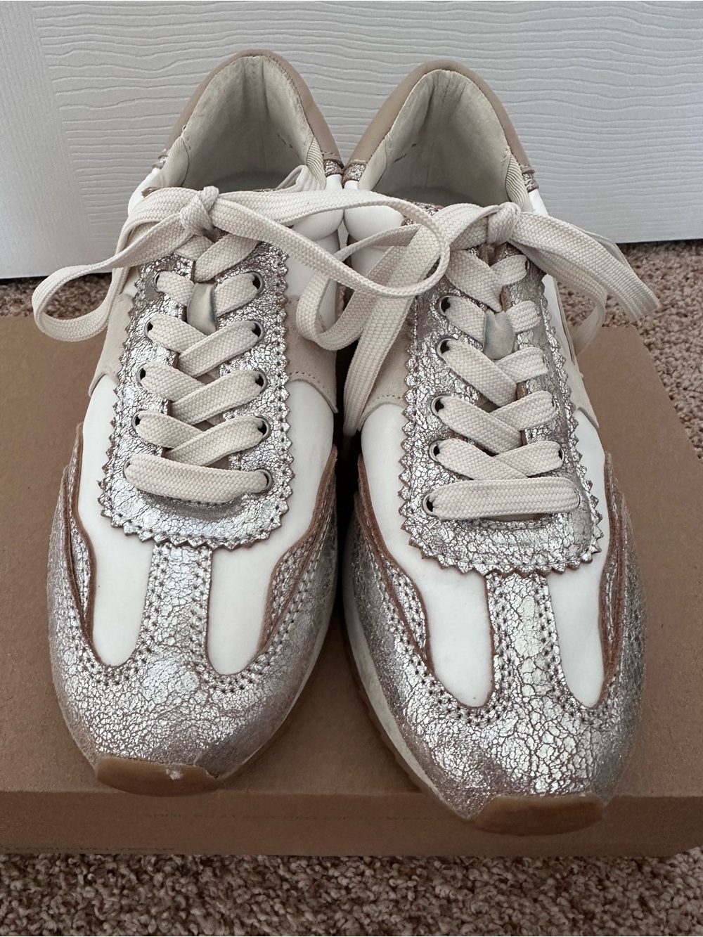 Dolce Vita stylish Metallic silver and suede women’s athletic sneakers.